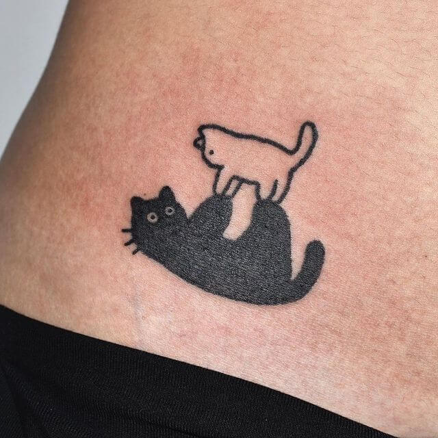 cute cat tattoo on stomach