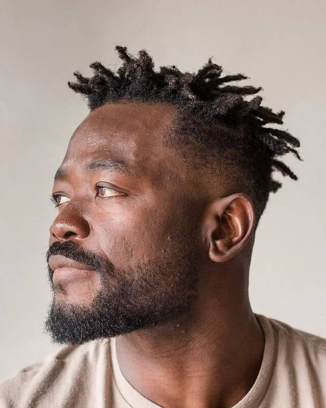 Men's deadlock hairstyle for round face