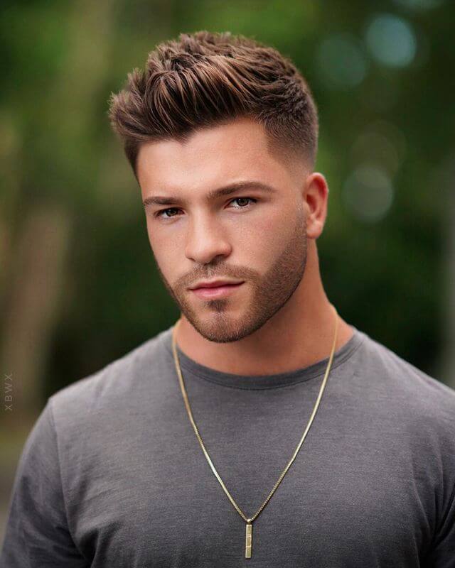 Men's round face long top short sides