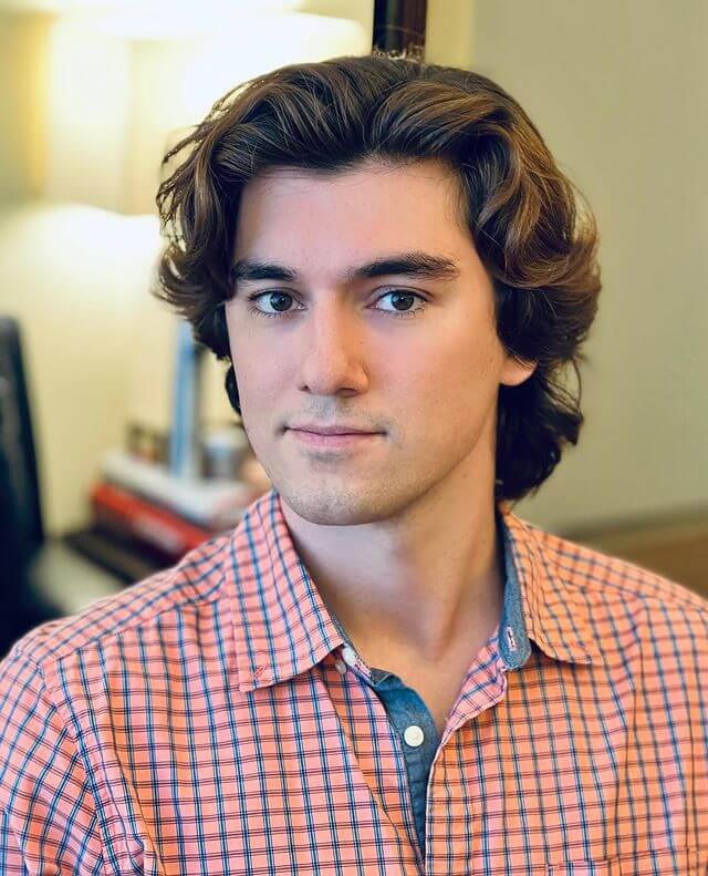 Sleek Wavy Hairstyle With Middle Part