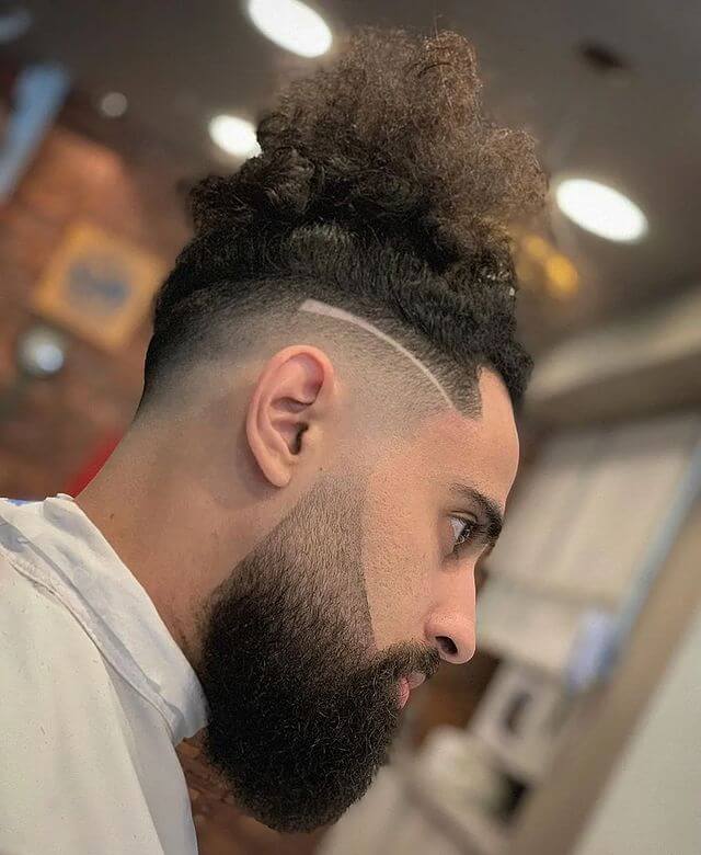 Wavy Top Knot With Seamless Fade