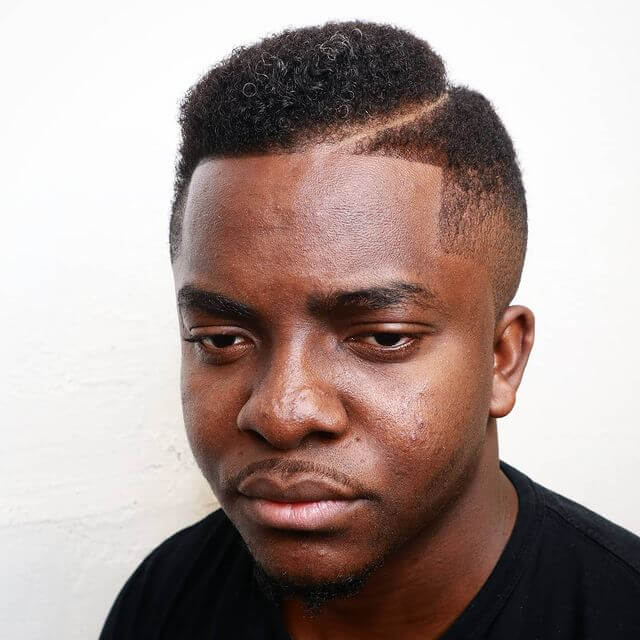 mini afro curly hairstyle for black men