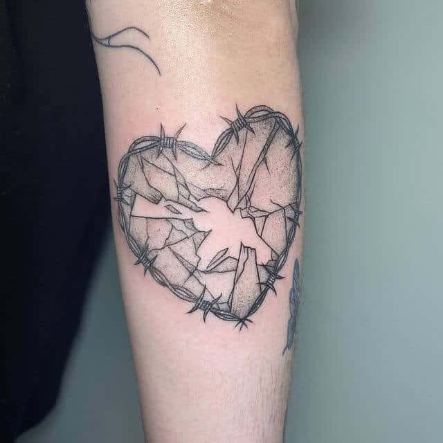 Barbed Wire Tattoo of Broken Heart