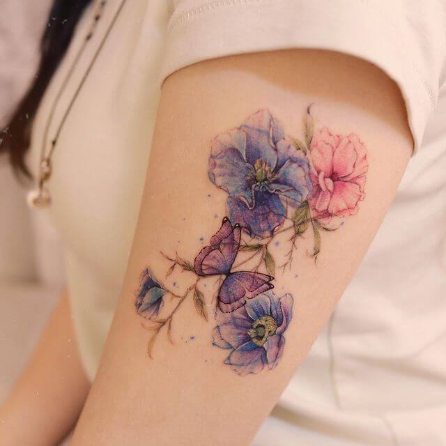 Blue Poppy Flower Tattoo Design On Upper Arm