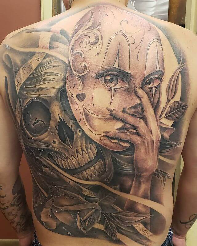 Laugh Now Cry Later Tattoo On The Back