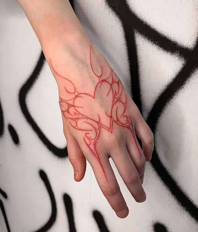 Abstract Red Heart Tattoo on Hand