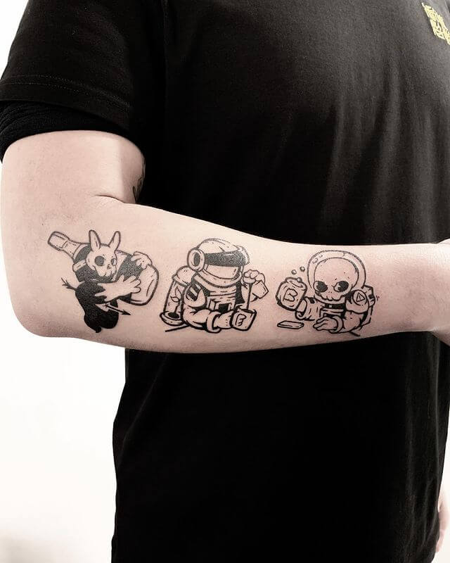 Astronauts In Galaxy Bar tattoo