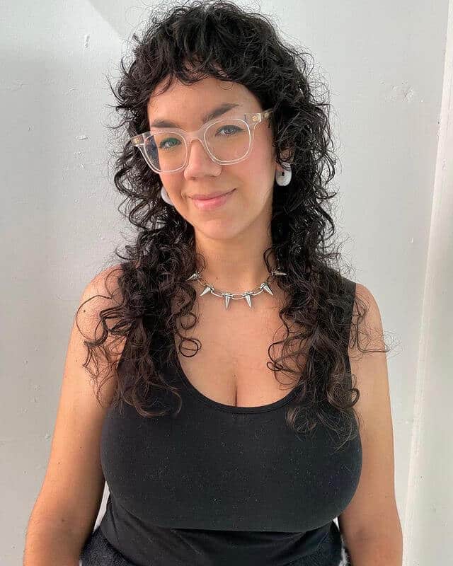Curly Wolf Haircut with Baby Bangs