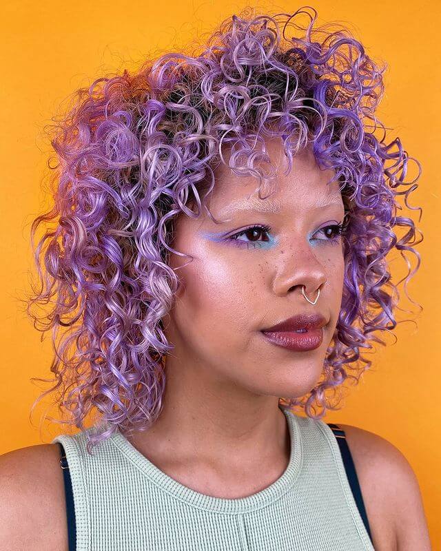 Lavender wolf cut curly hair