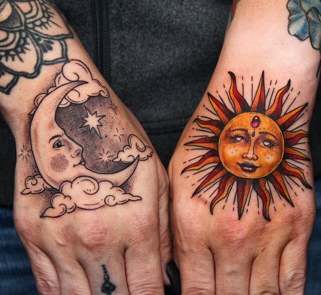 moon and sun hand tattoo