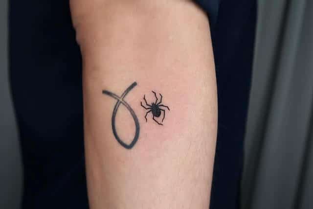 Small spider tattoo