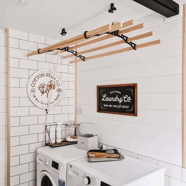 farmhouse laundry room white tile walls