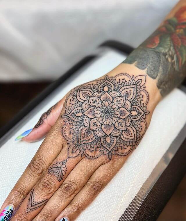 mandala hand tattoo