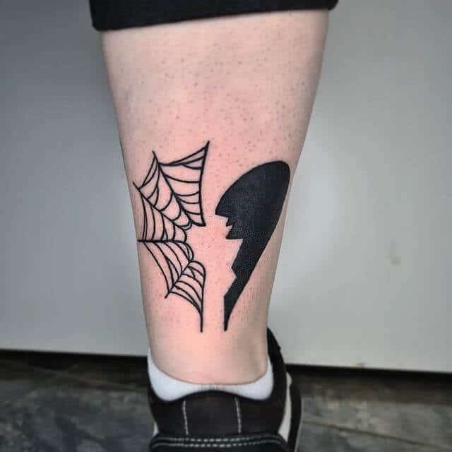 spider web heart tattoo design with meaning
