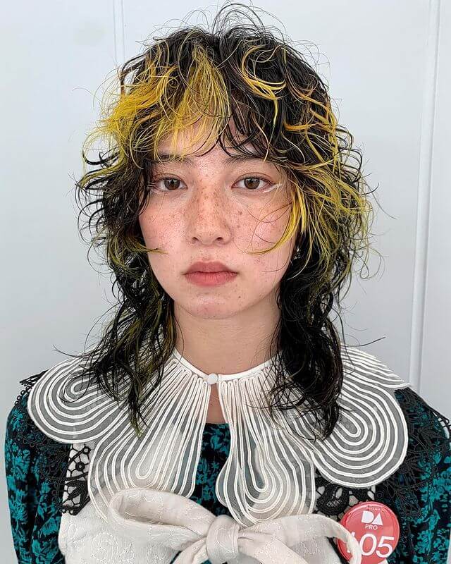 Wolf Cut Curly Hair With Yellow Skunk Stripe