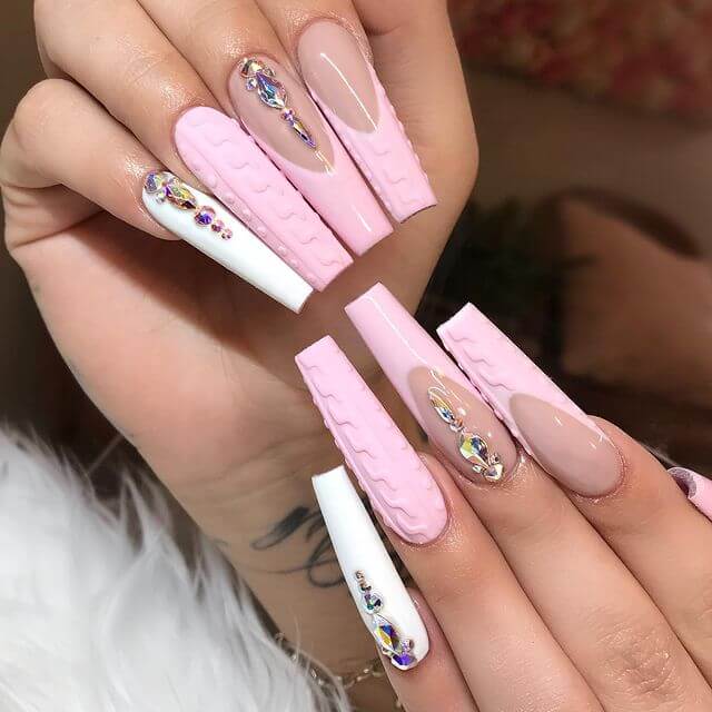 Light pink and white sweater nails