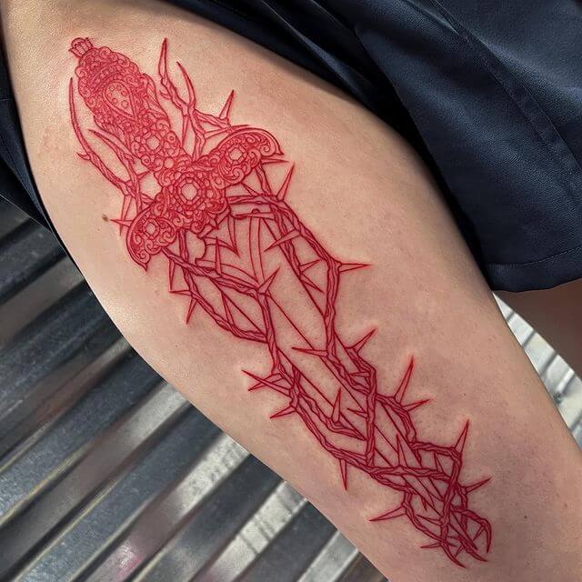 red dagger tattoo