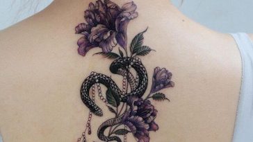 snake and flower back tattoo
