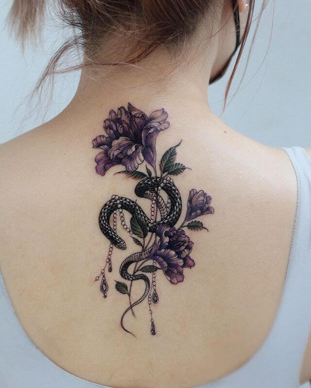 Snake And Flower Back Tattoo