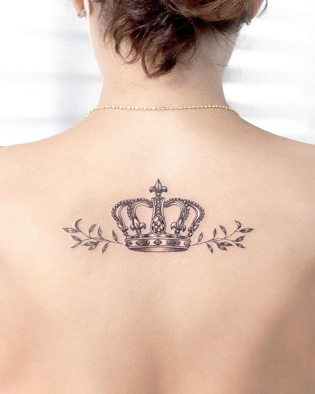 Crown and leaves tattoo