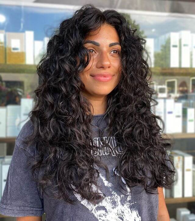 long back wolf cut curly hair