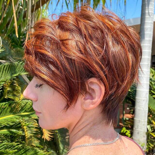 Feminine copper pixie cut