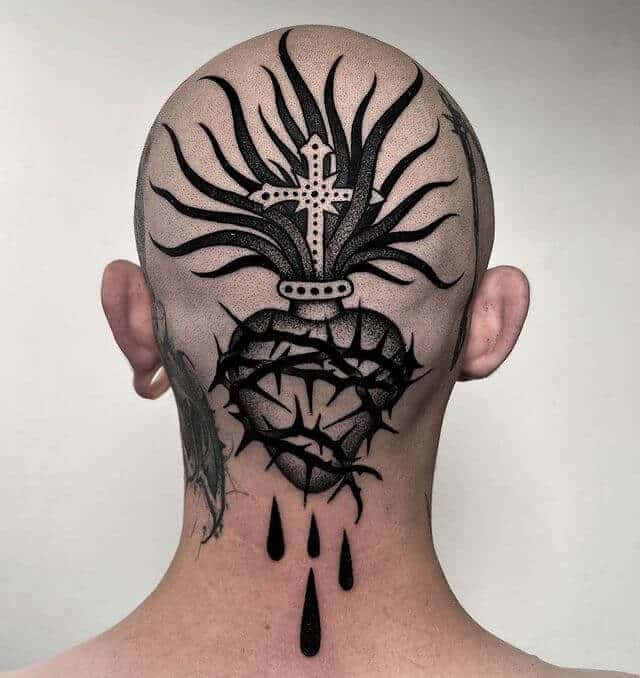 Sacred heart tattoo on head tattoo
