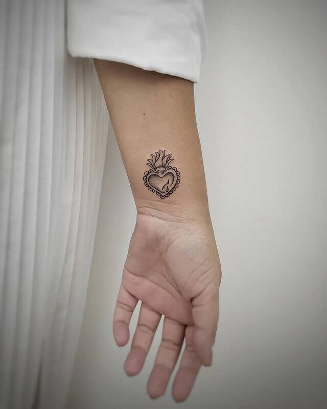 Small sacred heart tattoo