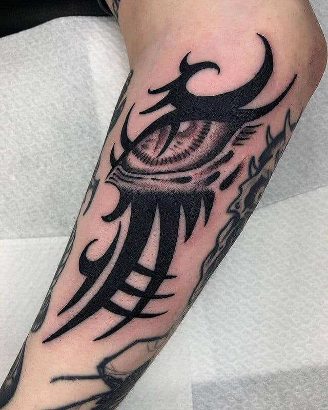 Tribal Dragon Eye Tattoo Cover Up