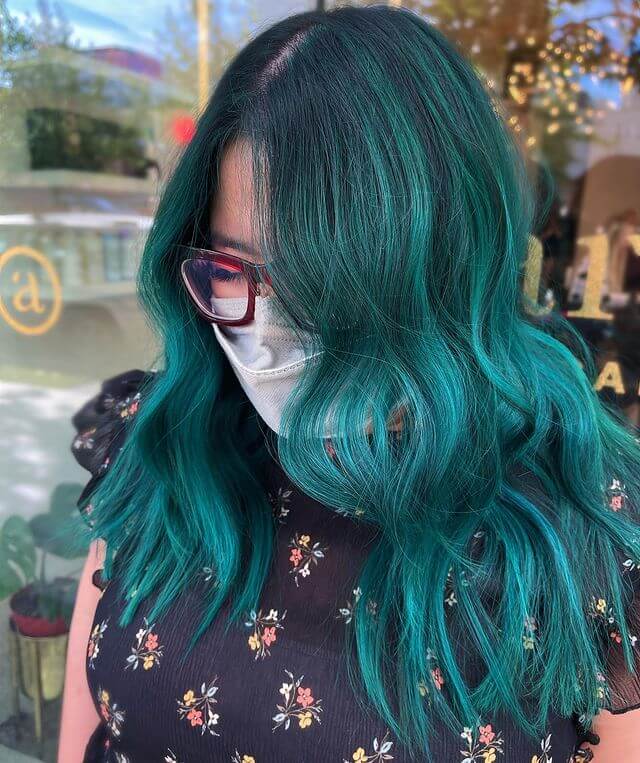 black hair and green balayage