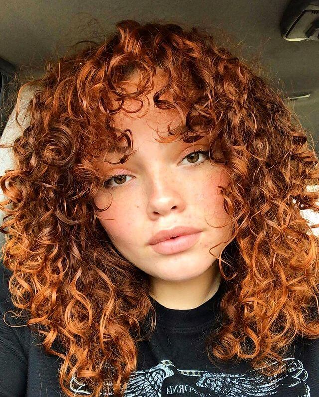 copper wolf cut curly hair