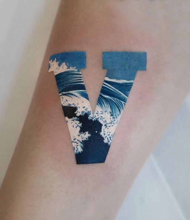 wave letter tattoo