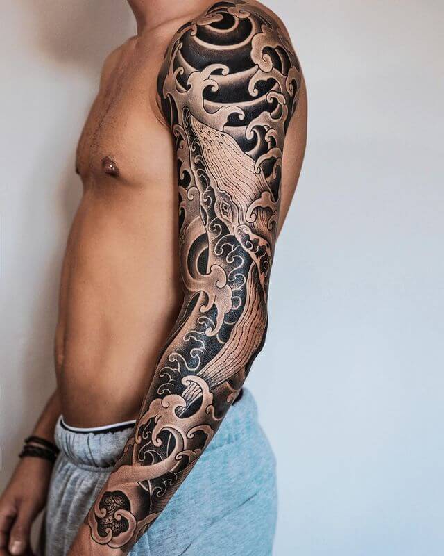 whale in the wave tattoo