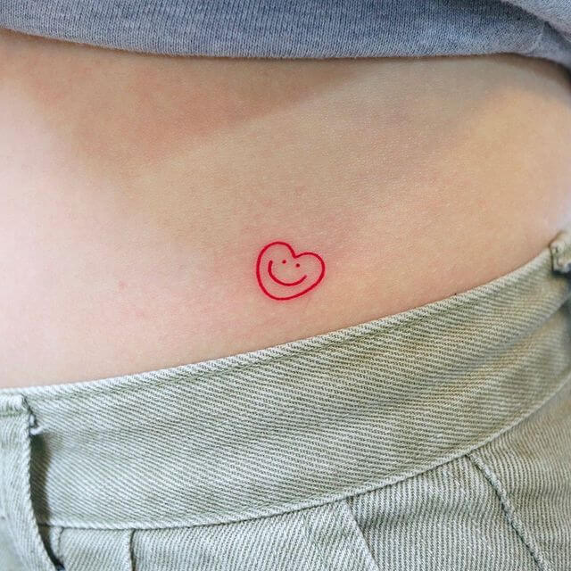 small smiling heart tattoo