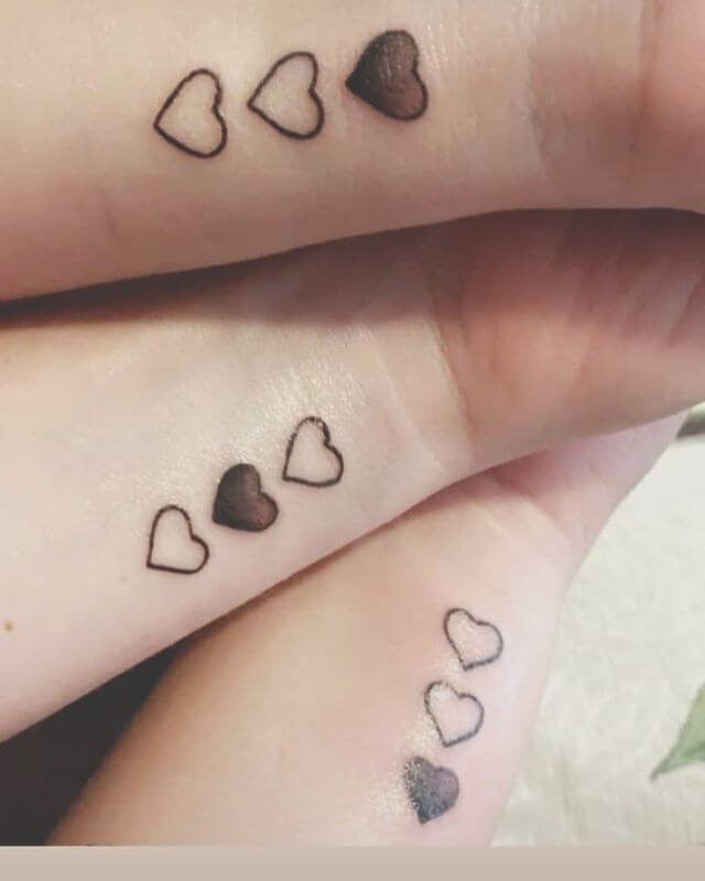 3 Sister Matcing Hearts Tattoo