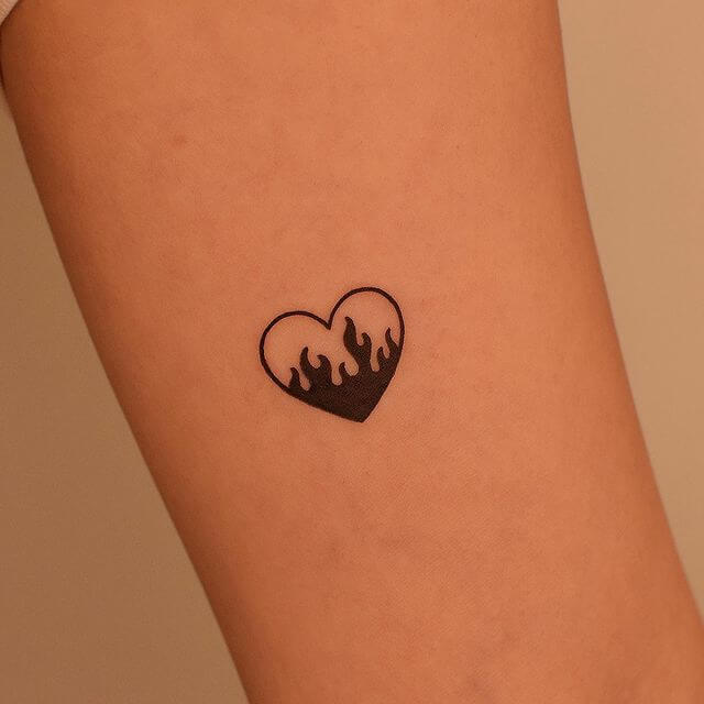 fire heart tattoo on arm