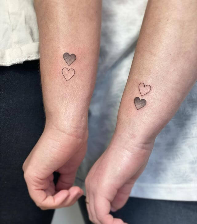 matching two hearts tattoo