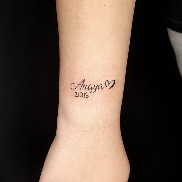 name and heart tattoo