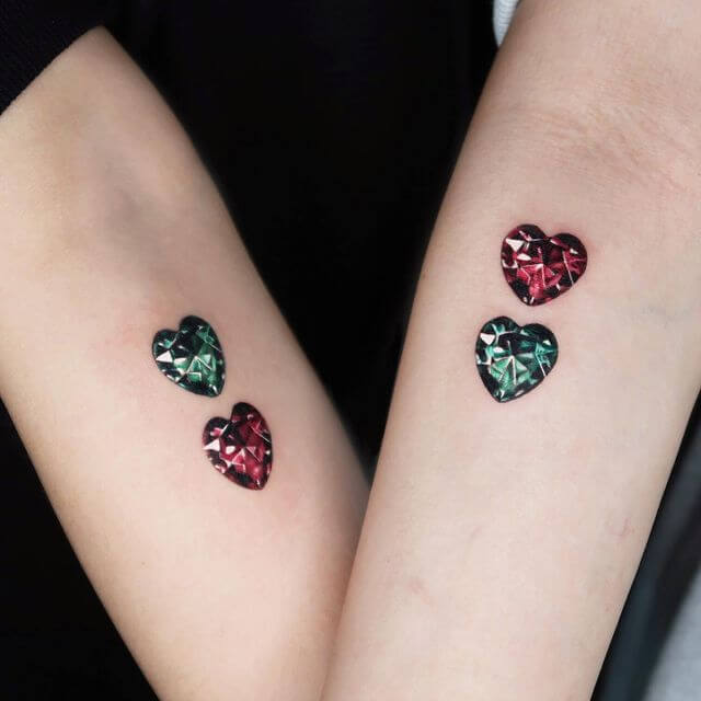 small heart shaped jewel tattoo