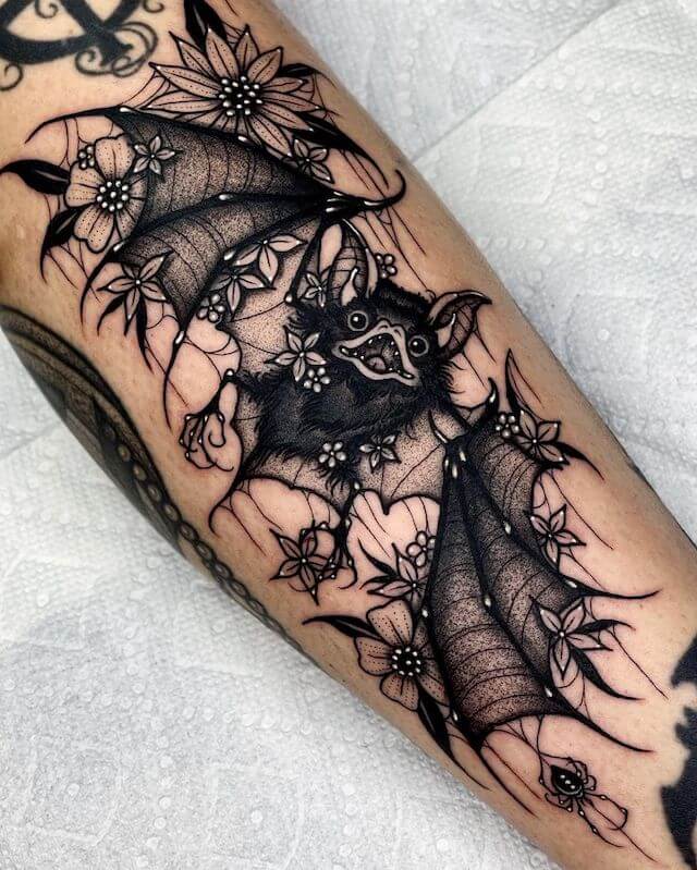 Bat and Flower Tattoo