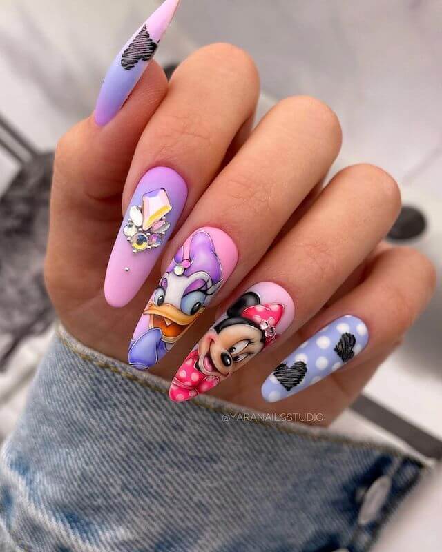 Stiletto Disney nails.
