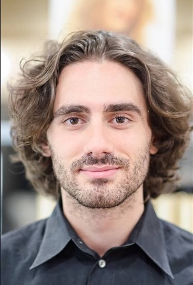 Wavy Haircuts for Men with a Middle Part