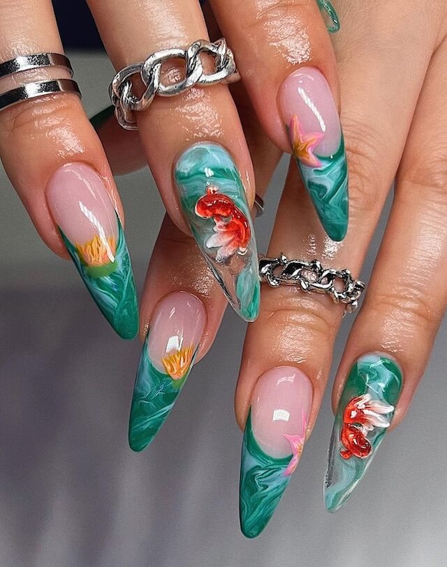 Zodiac design on stiletto nails