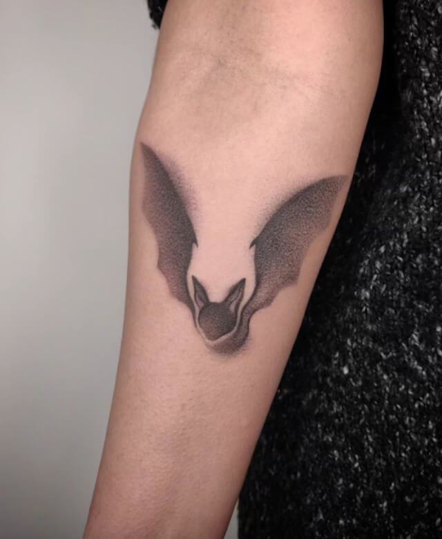 Flying Bat Silhouettes Tattoo