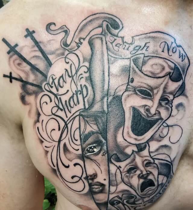 Laugh now cry later half chest tattoo