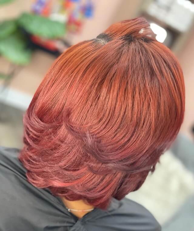 Feathered cut for black woman