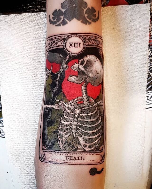 Black and red ink death tarot card tattoo