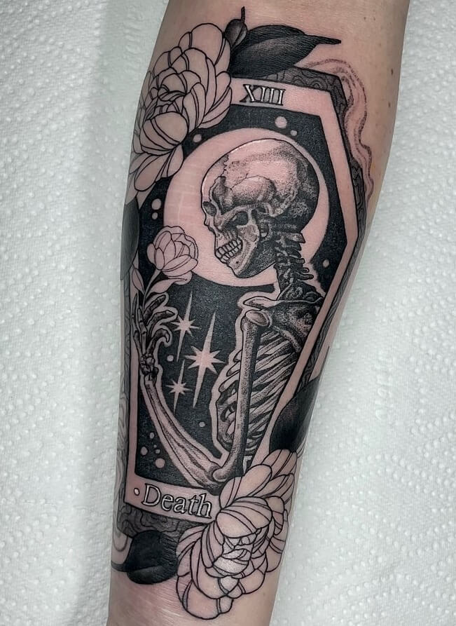 Skeleton and flower death tarot card tattoo