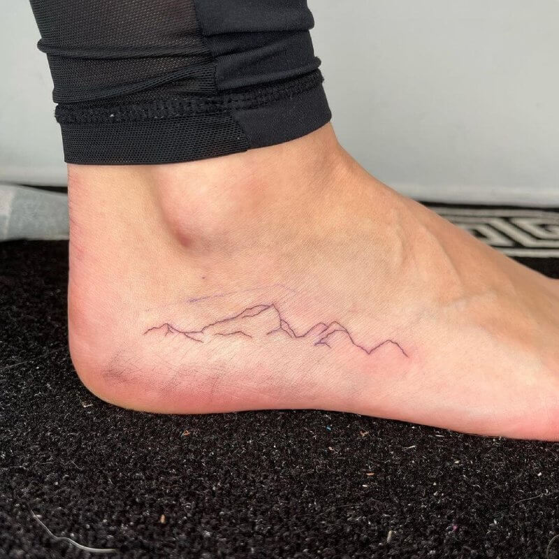 fiminine mountain tattoo