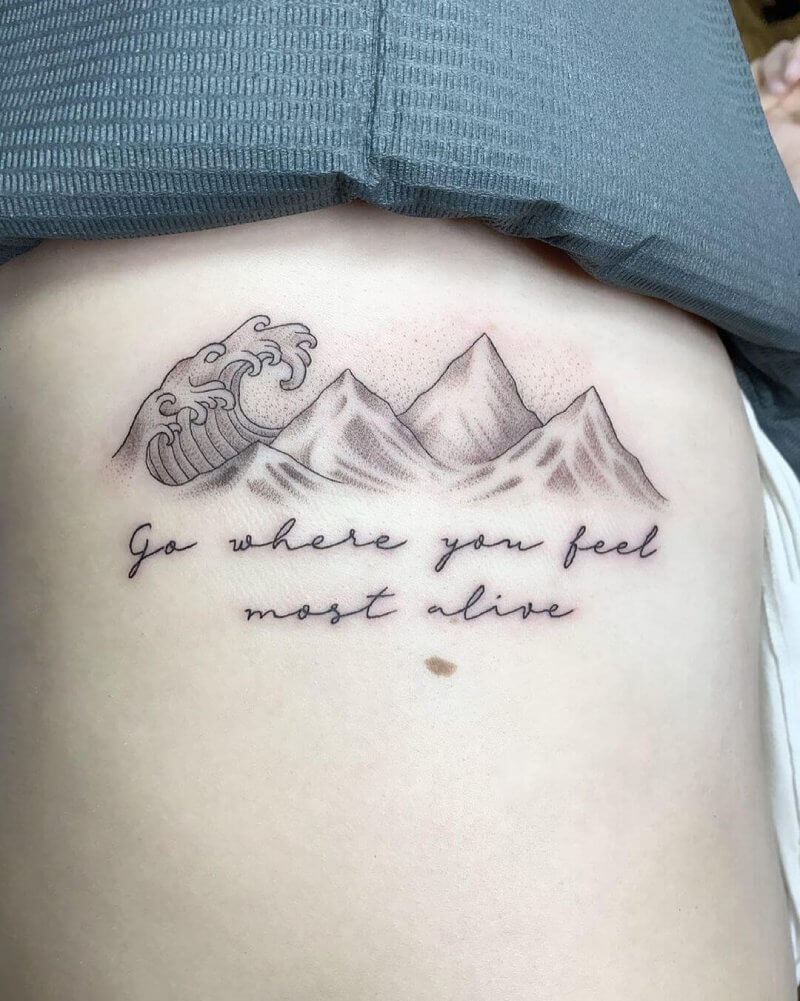 fiminine mountain tattoo